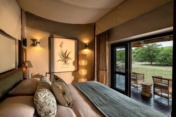 Luxury suite bedroom with private deck