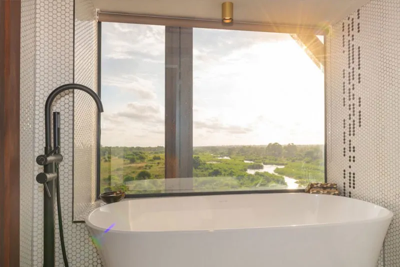 Luxury suite bathroom at Kruger Shalati