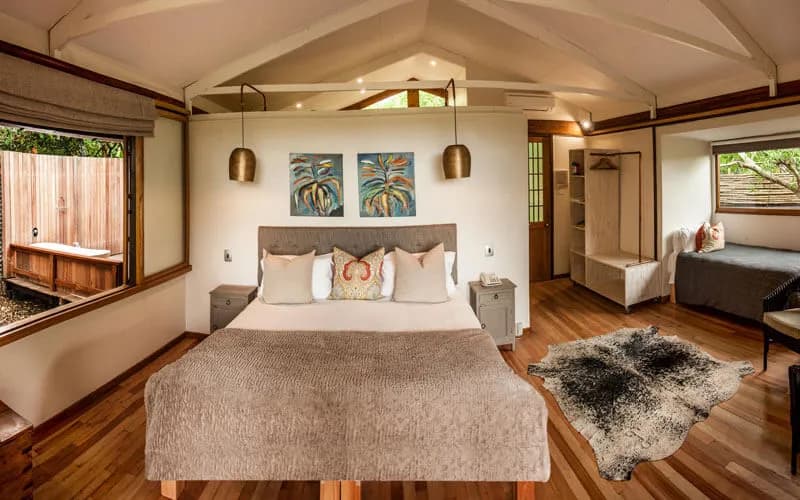 Standard room interior at Makakatana Bay Lodge