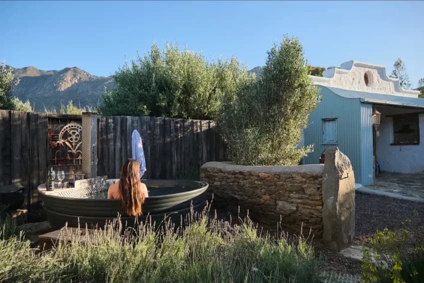 Hot tub in private garden at Olive Stone Farm